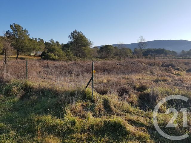 Afficher la photo en grand terrain à vendre - 1000.0 m2 - LA CRAU - 83 - PROVENCE-ALPES-COTE-D-AZUR - Century 21 Le Rocher
