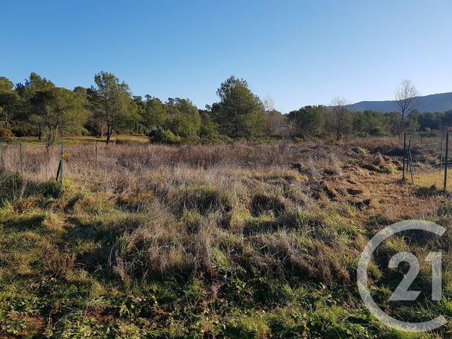 Afficher la photo en grand terrain à vendre - 1000.0 m2 - LA CRAU - 83 - PROVENCE-ALPES-COTE-D-AZUR - Century 21 Le Rocher